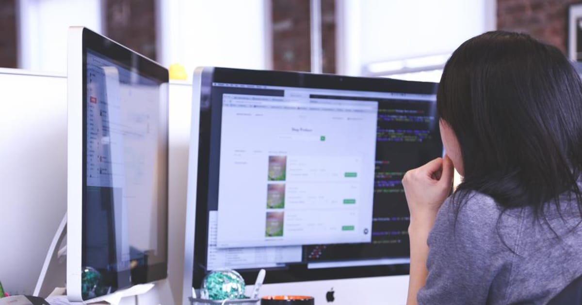 Computer monitors office — illustrating an article on Best AI Security Practices for LLM Apps A Production Checklist